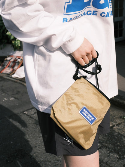 BAGGAGE SACOCHE BEIGE