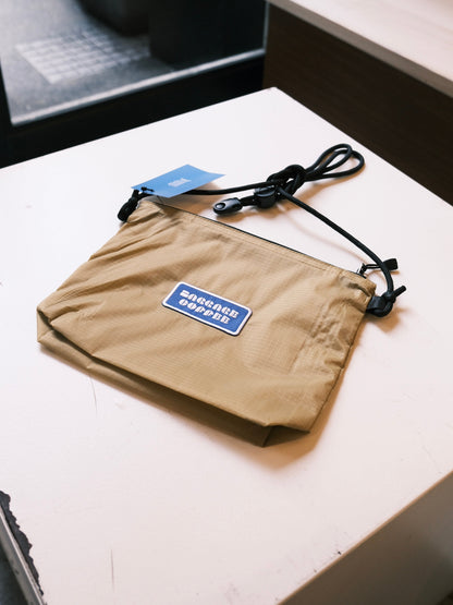BAGGAGE SACOCHE BEIGE
